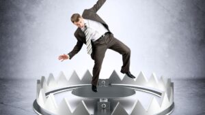 罠にかかるビジネスマン